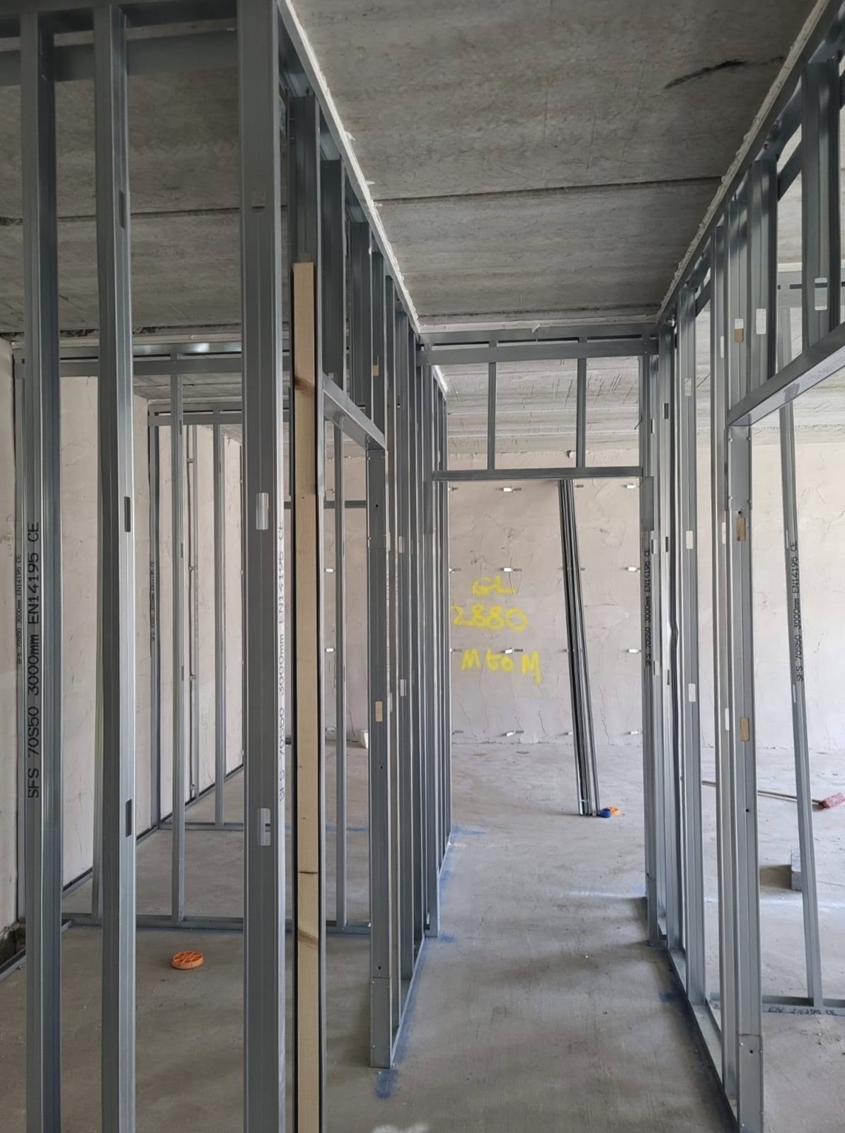 Commercial corridor partition framing before boarding