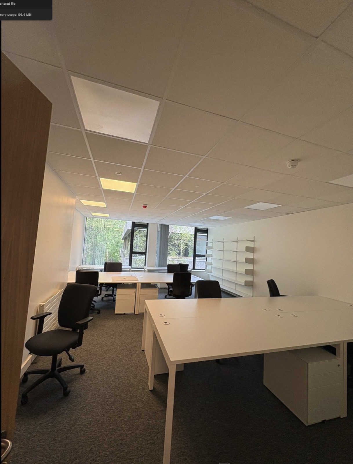 Completed UCD Newman office with suspended ceiling and desks installed