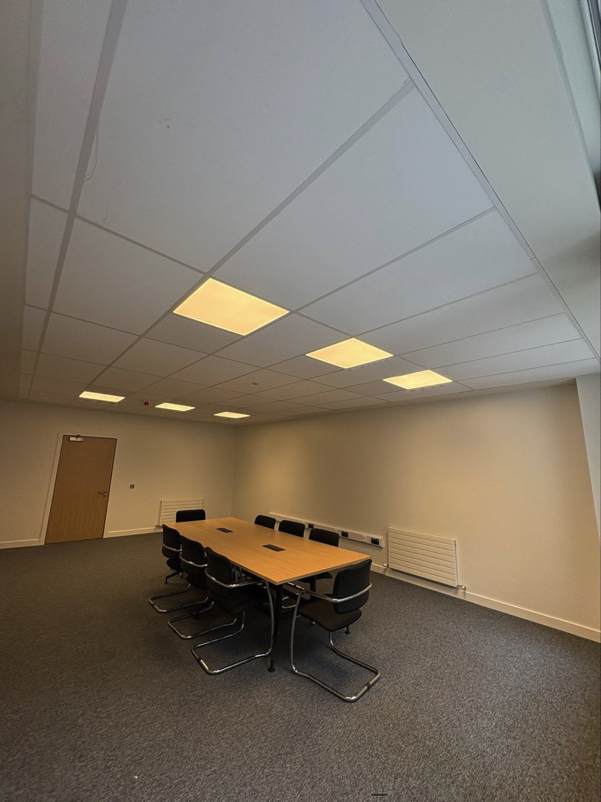 Completed UCD Newman meeting room with finished ceiling and walls